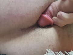Observe this fellow have fun with a fake pink cigar for his ambisexual elations